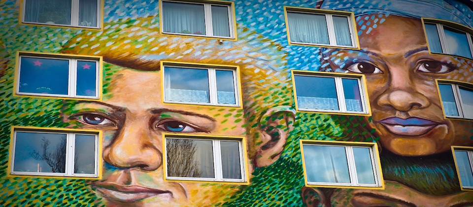 Photo of a mural depicting two people of color